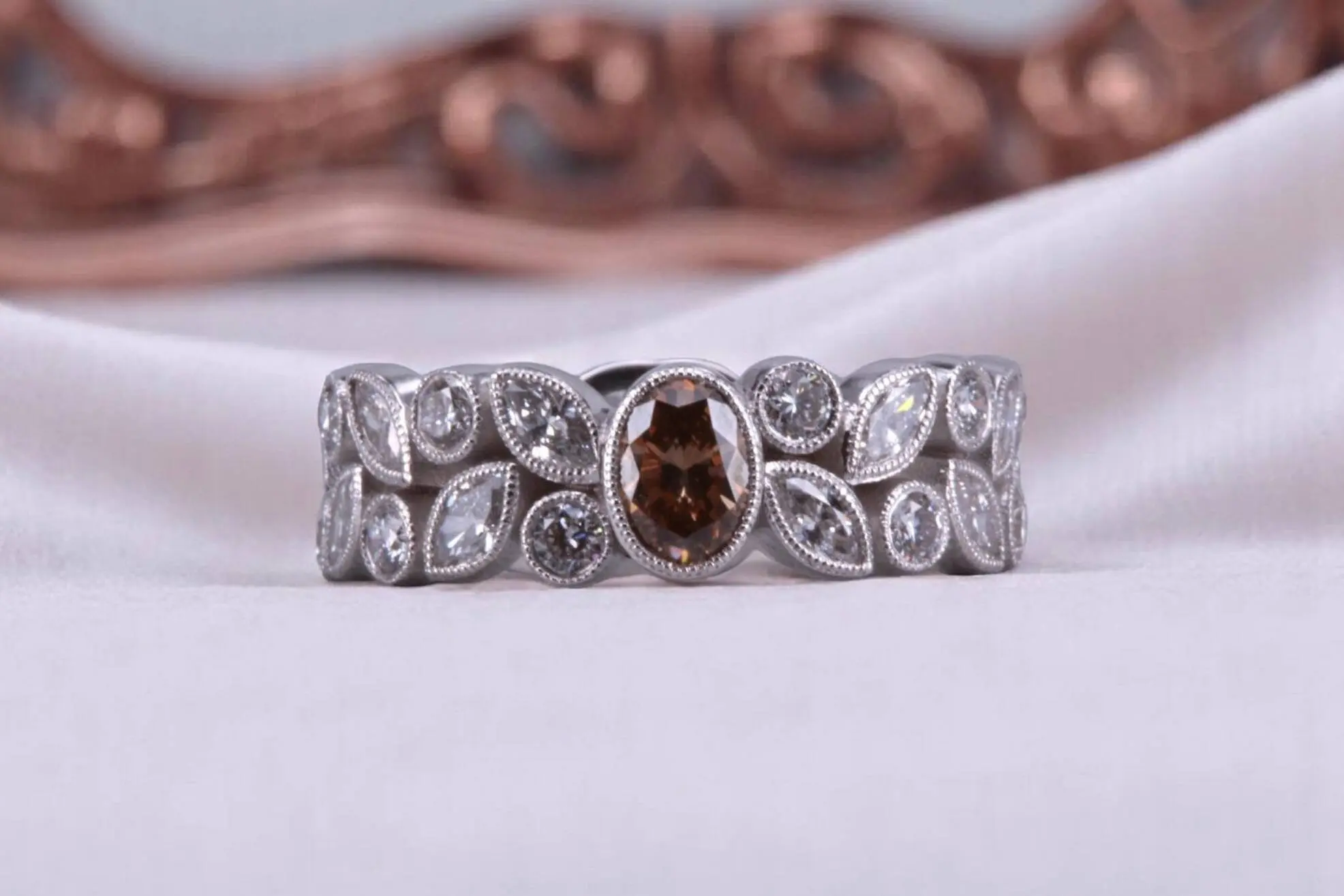 Non-traditional rootbeer diamond floral ring for couples in Poway